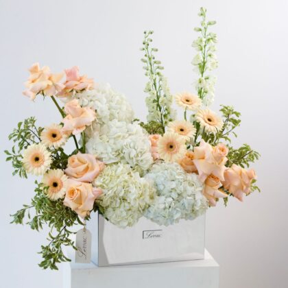 Mirror stand with flower arrangement
